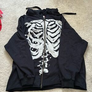 urban outfitters skeleton zip up